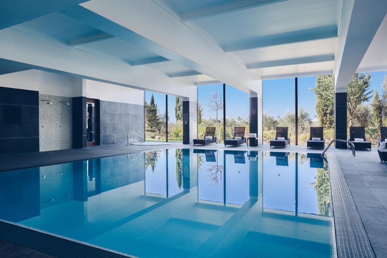 Convento Do Espinheiro, Historic Hotel & Spa Evora Exterior photo The pool at the hotel